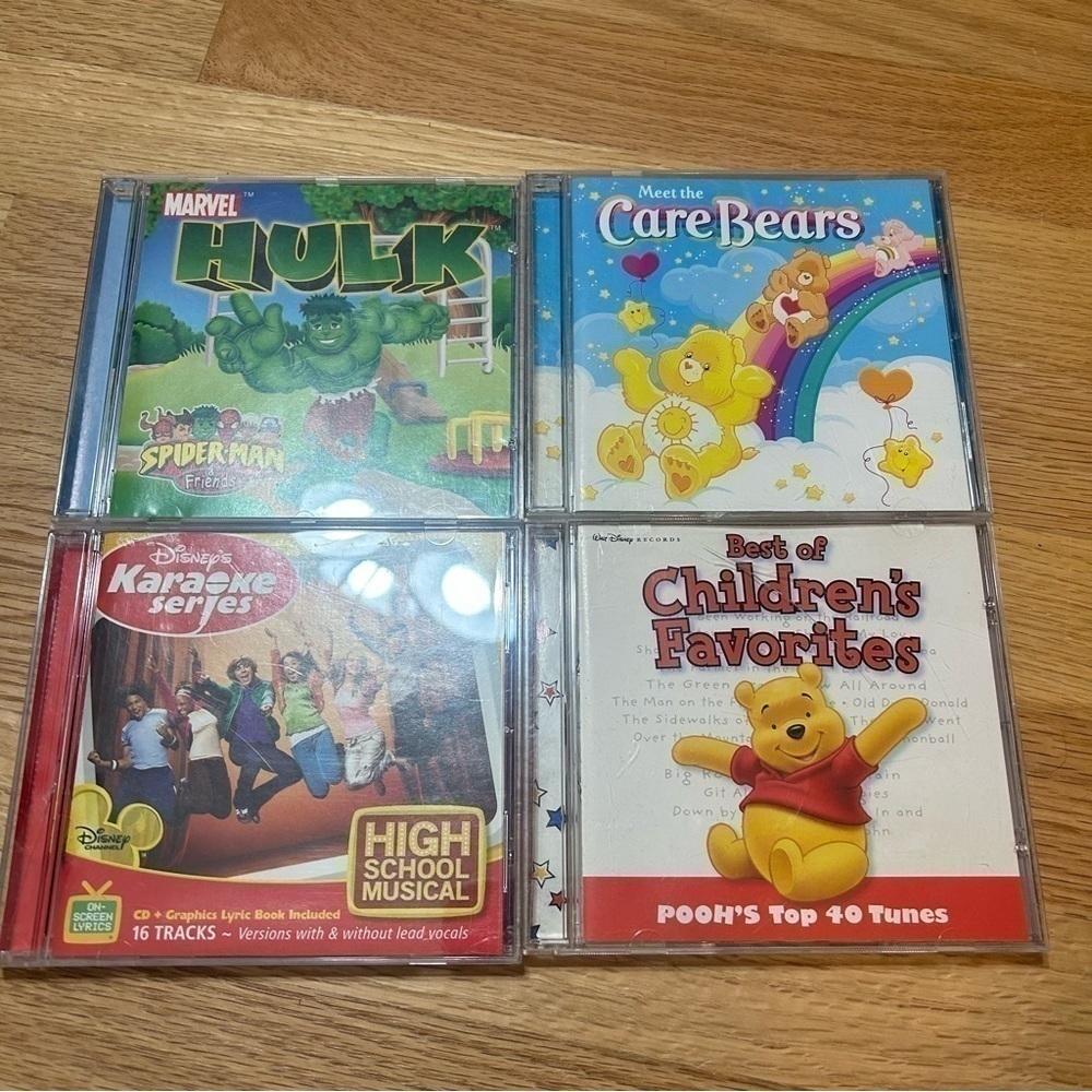 Kids CD Bundle Disney Pooh’s Top 40 Tunes Care Bears Marvel Hulk High School